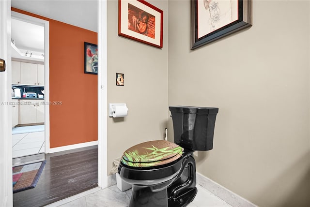 9341 E Bay Harbor Dr Unit 3D, Bay Harbor Islands, FL 33154 - bathroom with baseboards and marble look tile flooring