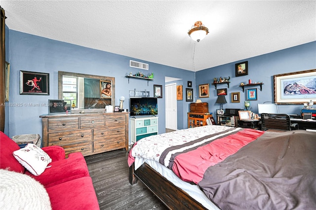 9341 E Bay Harbor Dr Unit 3D, Bay Harbor Islands, FL 33154 - bedroom featuring dark wood-style floors and a textured ceiling