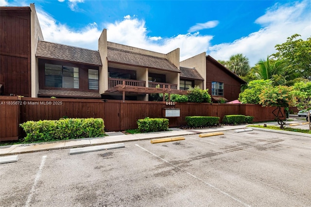 6455SW SW 116th Pl Unit C, Miami, FL 33173 - view of building exterior featuring uncovered parking