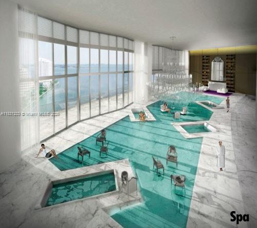 495 SE Brickell Ave Unit 1511, Miami, FL 33131 - view of pool featuring a pool with connected hot tub