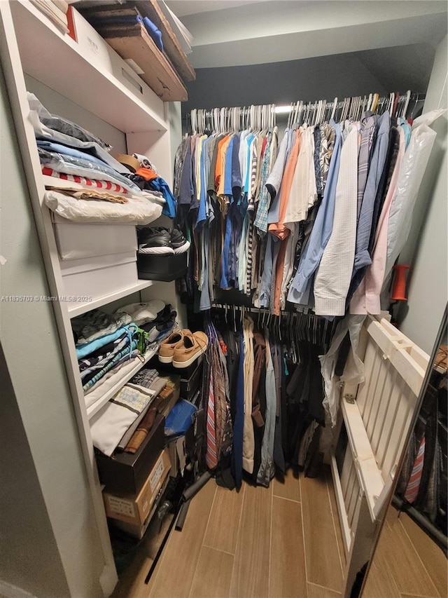 349 Meridian Ave Unit B103, Miami Beach, FL 33139 - walk in closet featuring wood finish floors