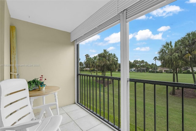 2420 Deer Creek Country Club Blvd Unit 203-D, Deerfield Beach, FL 33442 - sunroom with tile patterned floors