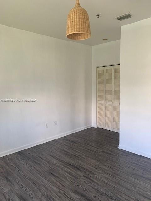 1244 Pennsylvania Ave Unit 306, Miami Beach, FL 33139 - empty room with dark wood-type flooring