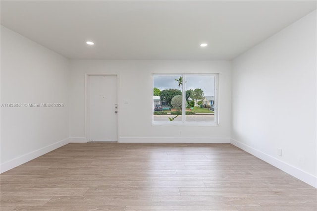 4516 Mainland Dr, Tamarac, FL 33319 - spare room featuring light wood-style floors and recessed lighting