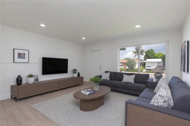 4516 Mainland Dr, Tamarac, FL 33319 - living room featuring light wood-style flooring and recessed lighting