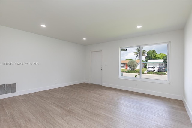 4516 Mainland Dr, Tamarac, FL 33319 - empty room featuring light wood-style floors and recessed lighting