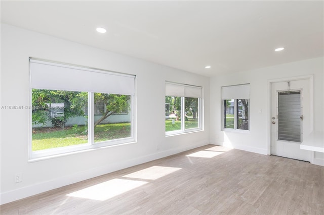 4516 Mainland Dr, Tamarac, FL 33319 - spare room with wood finished floors and recessed lighting