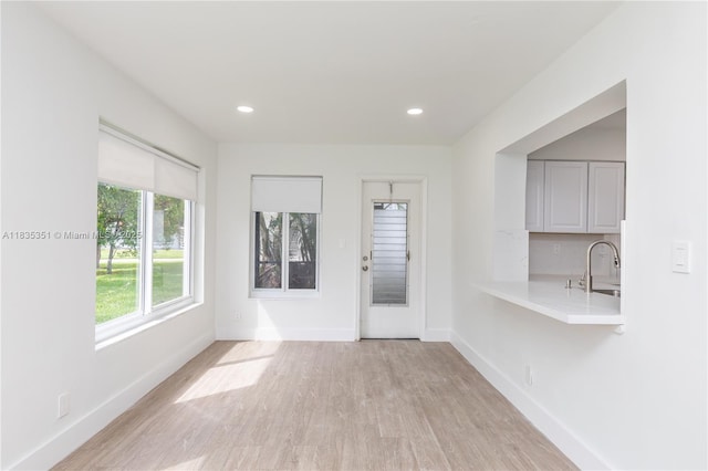 4516 Mainland Dr, Tamarac, FL 33319 - unfurnished dining area featuring light wood finished floors and recessed lighting