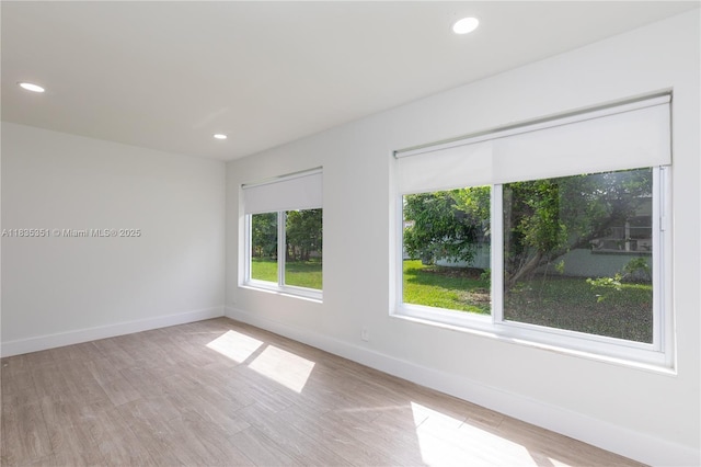 4516 Mainland Dr, Tamarac, FL 33319 - unfurnished room with light wood-style floors and recessed lighting
