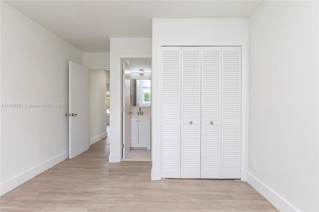 4516 Mainland Dr, Tamarac, FL 33319 - unfurnished bedroom with a closet and light wood-style floors