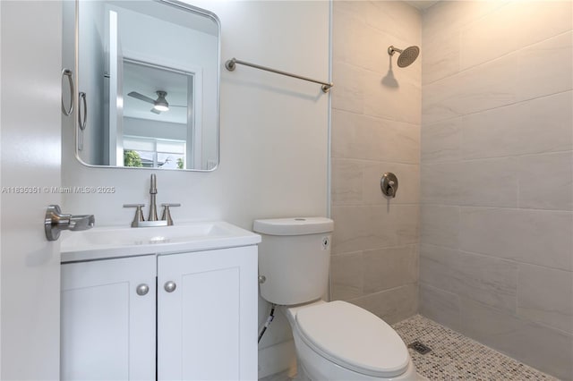 4516 Mainland Dr, Tamarac, FL 33319 - bathroom featuring a tile shower, vanity, and ceiling fan