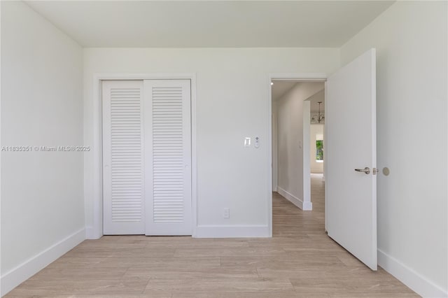 4516 Mainland Dr, Tamarac, FL 33319 - unfurnished bedroom featuring a closet and light wood finished floors