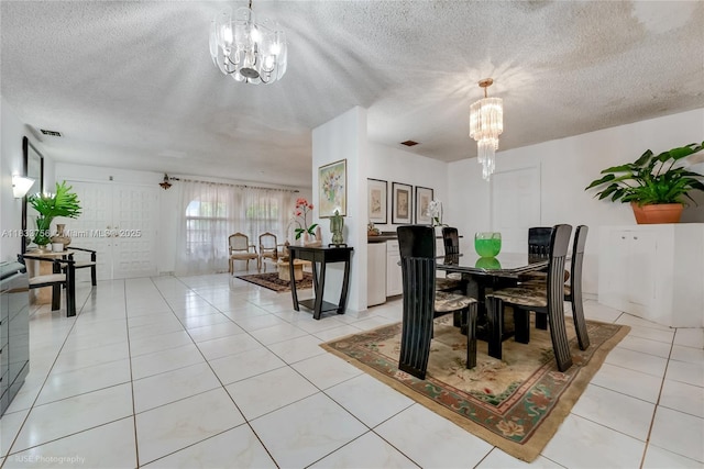 4235 SW 97th Ave, Miami, FL 33165 - dining space featuring a chandelier, light tile patterned floors, and a textured ceiling