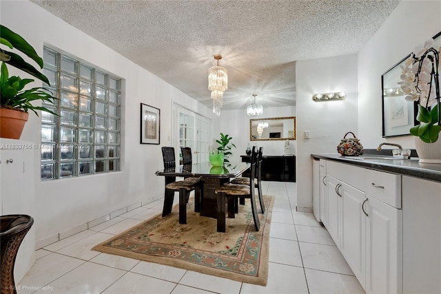 4235 SW 97th Ave, Miami, FL 33165 - dining room featuring a chandelier, a textured ceiling, and light tile patterned flooring