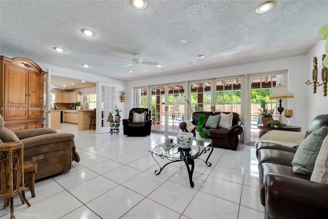 4235 SW 97th Ave, Miami, FL 33165 - living area with french doors, a textured ceiling, ceiling fan, light tile patterned flooring, and recessed lighting