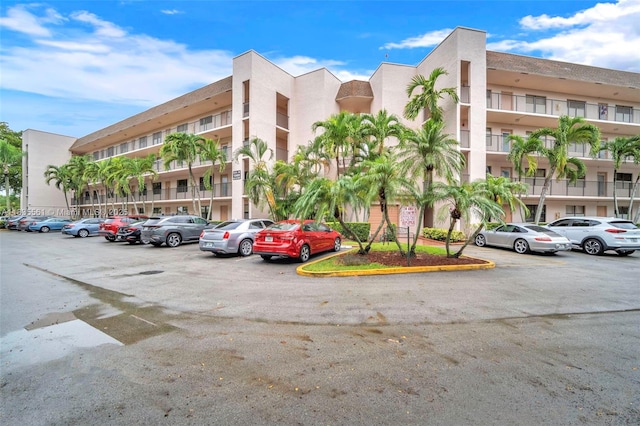 10400 NW 30th Ct Unit 305, Sunrise, FL 33322 - view of apartment building / complex with uncovered parking