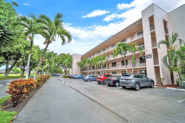 10400 NW 30th Ct Unit 305, Sunrise, FL 33322 - view of apartment building / complex featuring uncovered parking