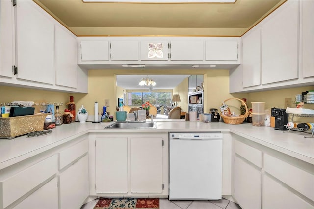 10400 NW 30th Ct Unit 305, Sunrise, FL 33322 - kitchen with white dishwasher, white cabinets, and light countertops
