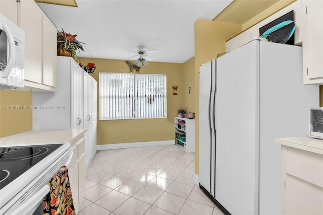 10400 NW 30th Ct Unit 305, Sunrise, FL 33322 - kitchen featuring white appliances, light countertops, white cabinets, ceiling fan, and light tile patterned floors