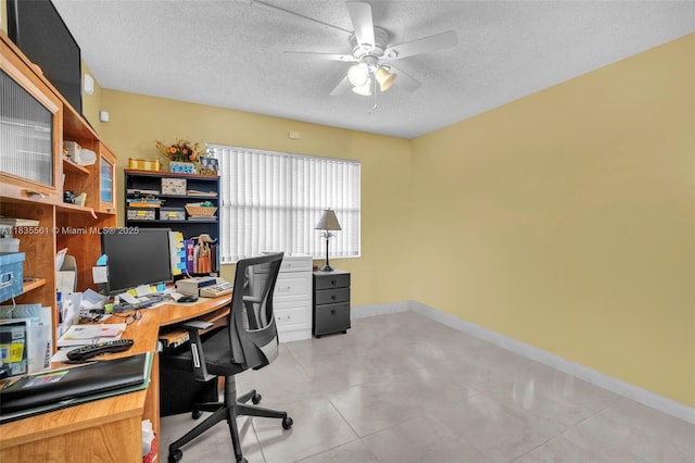 10400 NW 30th Ct Unit 305, Sunrise, FL 33322 - home office with a ceiling fan and a textured ceiling