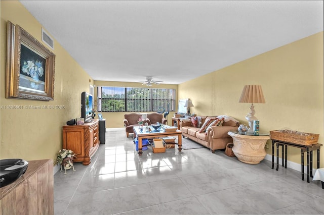 10400 NW 30th Ct Unit 305, Sunrise, FL 33322 - living area featuring a ceiling fan and light tile patterned floors