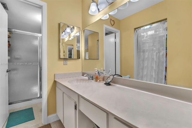 10400 NW 30th Ct Unit 305, Sunrise, FL 33322 - bathroom featuring a shower stall, vanity, and tile patterned flooring