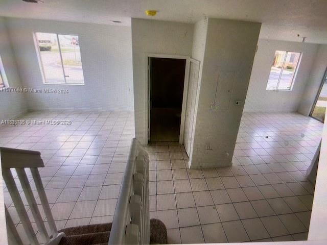 7325NW 174th Te # 104, Miami Lakes, FL 33015 - spare room with tile patterned floors