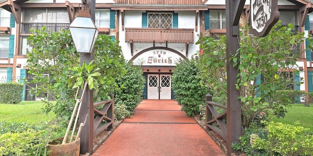 3750 Inverrary Dr Unit 1Z, Lauderhill, FL 33319 - doorway to property featuring stucco siding
