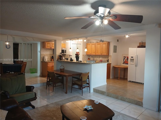 3750 Inverrary Dr Unit 1Z, Lauderhill, FL 33319 - living room featuring a ceiling fan and light tile patterned flooring