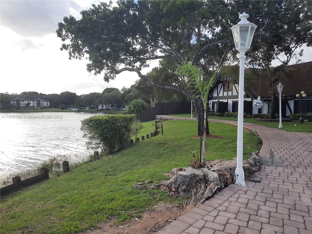 3750 Inverrary Dr Unit 1Z, Lauderhill, FL 33319 - view of community featuring a water view and a yard