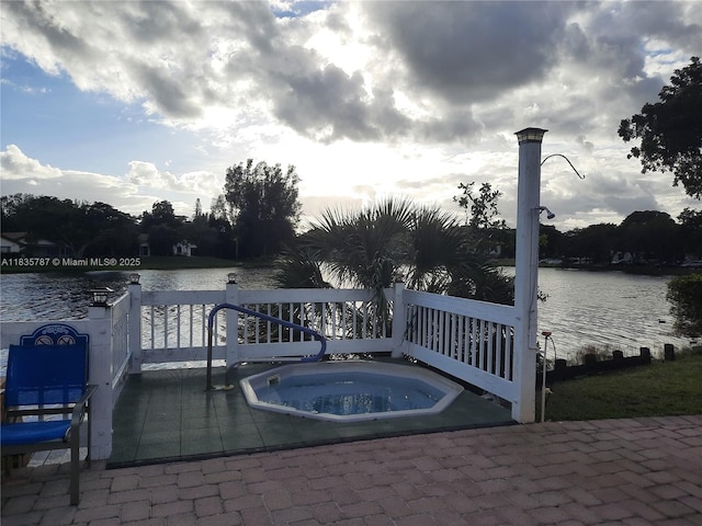 3750 Inverrary Dr Unit 1Z, Lauderhill, FL 33319 - view of pool featuring a water view and an in-ground hot tub