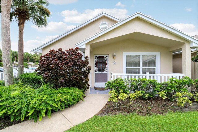 653 NW San Remo Cir, Port St Lucie, FL 34986 - view of front of house with stucco siding