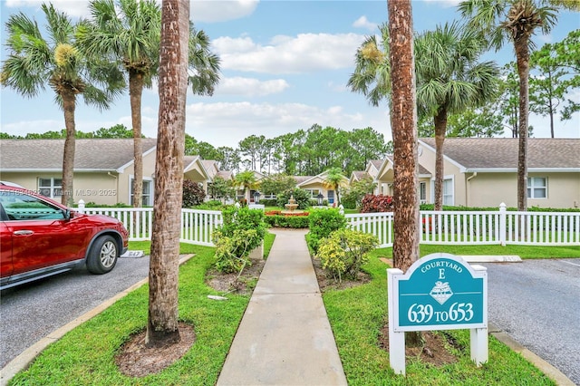 653 NW San Remo Cir, Port St Lucie, FL 34986 - surrounding community with a residential view