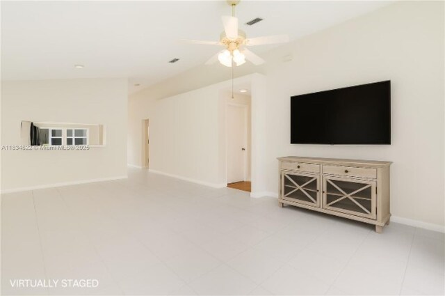 653 NW San Remo Cir, Port St Lucie, FL 34986 - unfurnished living room with a ceiling fan and baseboards