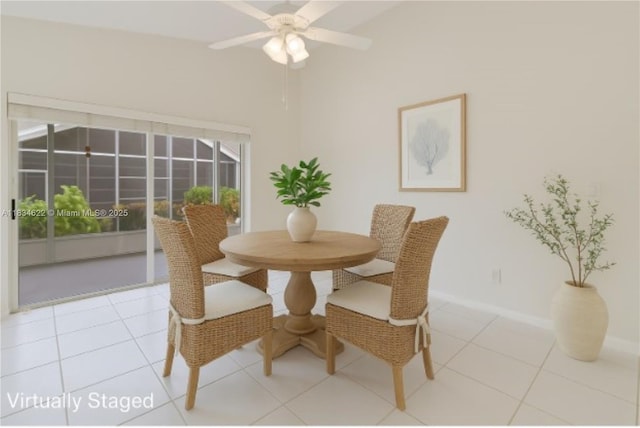 653 NW San Remo Cir, Port St Lucie, FL 34986 - tiled dining room with baseboards and a ceiling fan