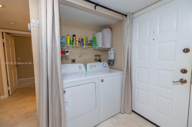 1280 S Alhambra Cir Unit 1310, Coral Gables, FL 33146 - laundry area with washer and clothes dryer and light tile patterned floors