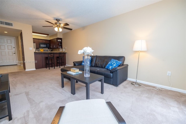 1280 S Alhambra Cir Unit 1310, Coral Gables, FL 33146 - living room with light colored carpet and ceiling fan