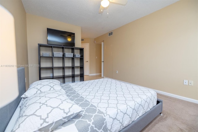 1280 S Alhambra Cir Unit 1310, Coral Gables, FL 33146 - carpeted bedroom with a textured ceiling and ceiling fan