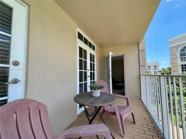 1280 S Alhambra Cir Unit 1310, Coral Gables, FL 33146 - balcony featuring french doors