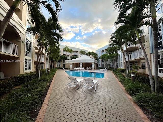 1280 S Alhambra Cir Unit 1310, Coral Gables, FL 33146 - community pool featuring a patio