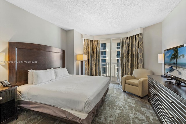 17375 Collins Ave Unit 1004, Sunny Isles Beach, FL 33160 - bedroom with access to outside and a textured ceiling