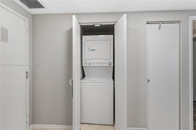 17375 Collins Ave Unit 1004, Sunny Isles Beach, FL 33160 - washroom featuring stacked washer and clothes dryer