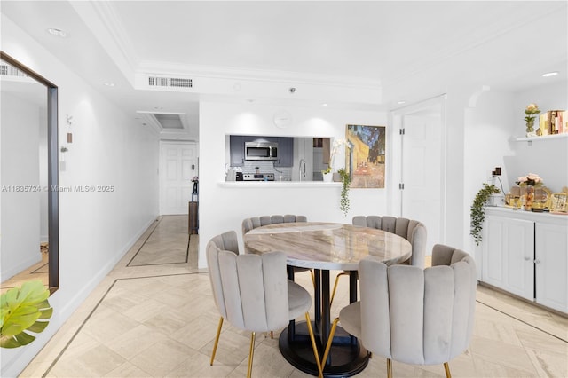 1717 N Bayshore Dr Unit A-3453, Miami, FL 33132 - dining space with crown molding and recessed lighting