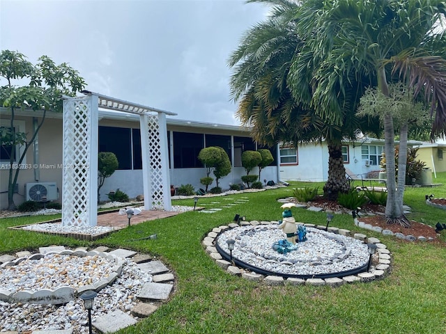 4811 NW 58th St, Tamarac, FL 33319 - view of grassy yard with a sunroom