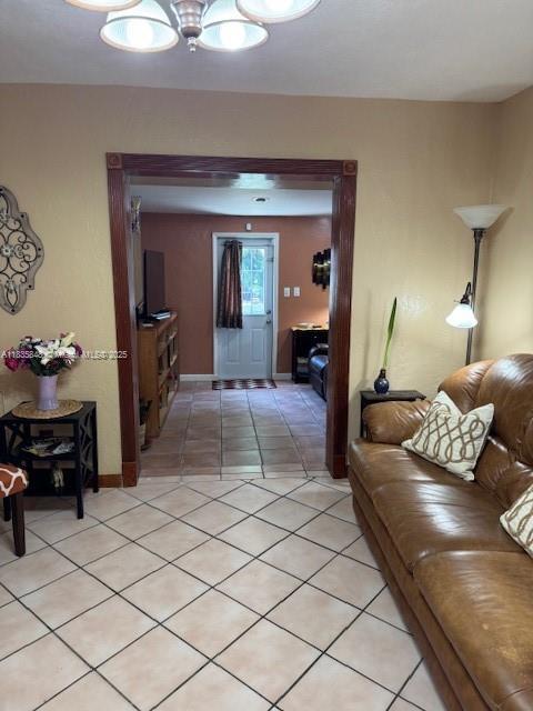 6424 SW 20th St, Miramar, FL 33023 - hall featuring light tile patterned flooring and baseboards