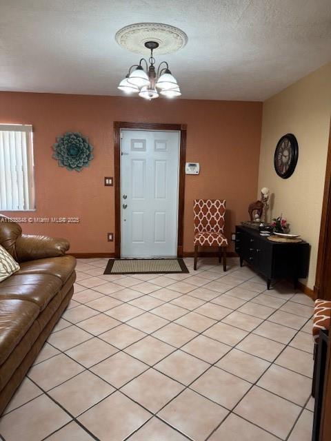 6424 SW 20th St, Miramar, FL 33023 - entryway featuring a chandelier and light tile patterned floors