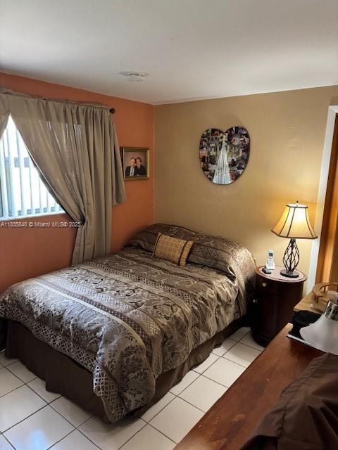 6424 SW 20th St, Miramar, FL 33023 - bedroom with light tile patterned floors