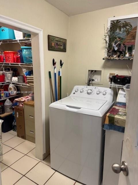 6424 SW 20th St, Miramar, FL 33023 - washroom with washer / dryer and light tile patterned flooring