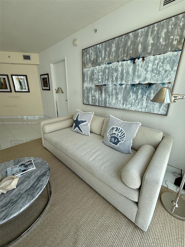 150 Sunny Isles Blvd Unit 1-1401, Sunny Isles Beach, FL 33160 - living area with carpet floors and a textured ceiling