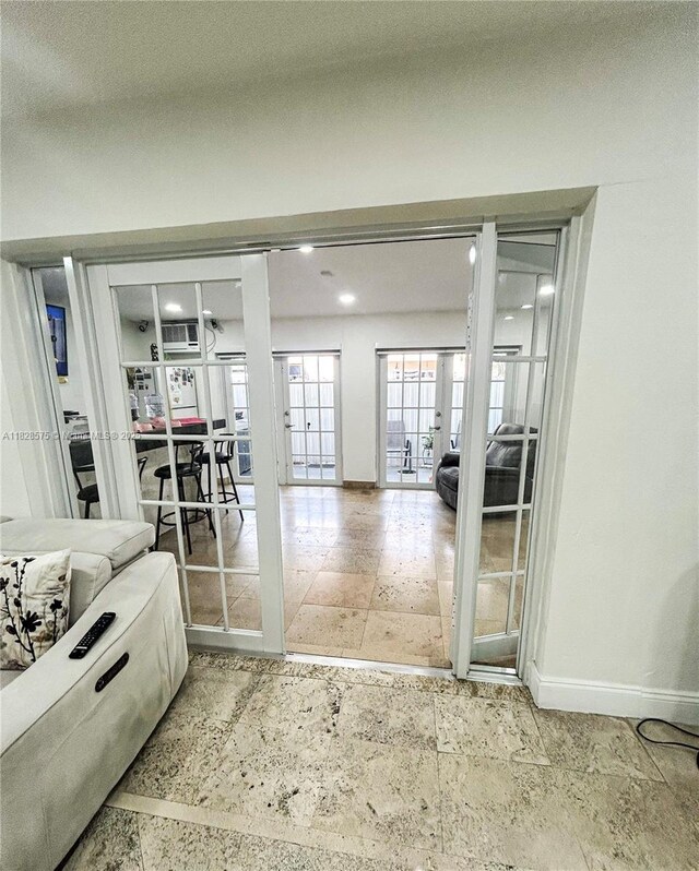 7060 W 2nd Way Unit 7060, Hialeah, FL 33014 - interior space with stone tile floors and french doors